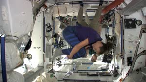 How do you measure weight in space?